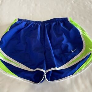 Nike woman’s dri-fit running shorts size medium.